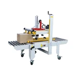 Upp- och neddriven höljeförseglingsmaskin